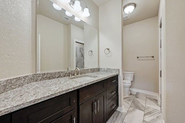 3303 Elija St Unit A & B, Austin, TX 78745 - bathroom featuring vanity and marble finish floors