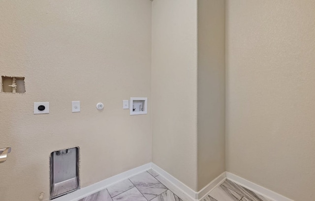 3303 Elija St Unit A & B, Austin, TX 78745 - laundry area featuring hookup for an electric dryer, washer hookup, hookup for a gas dryer, and light marble finish floors