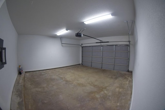 3303 Elija St Unit A & B, Austin, TX 78745 - garage with a garage door opener and baseboards