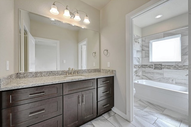 3303 Elija St Unit A & B, Austin, TX 78745 - bathroom featuring vanity, marble finish floors, and shower / bath combination