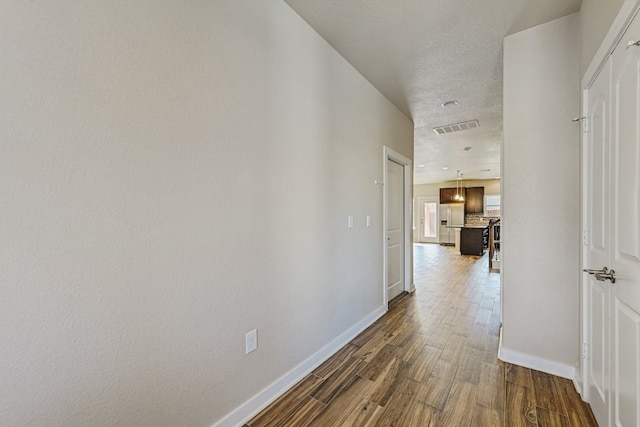 3303 Elija St Unit A & B, Austin, TX 78745 - corridor with dark wood-type flooring and baseboards