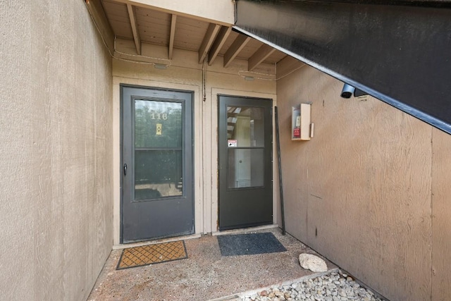 2600 Penny Ln Unit 115, Austin, TX 78757 - property entrance featuring stucco siding