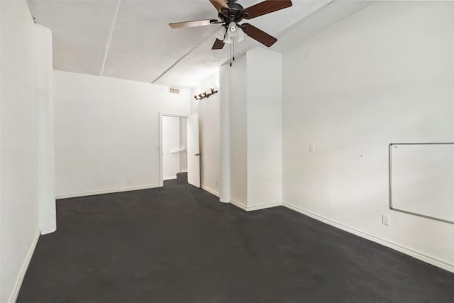 208 Old Potato Rd, Paige, TX 78659 - spare room with baseboards and ceiling fan