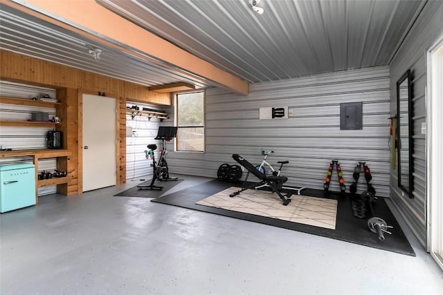 208 Old Potato Rd, Paige, TX 78659 - exercise area featuring wooden walls and electric panel