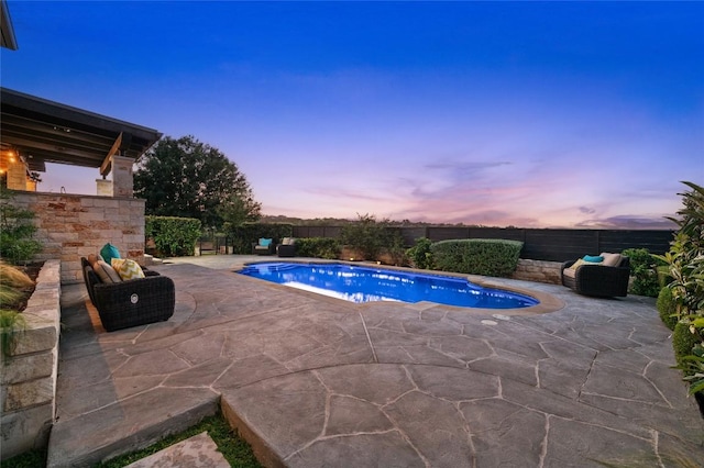 3810 Pawnee Pass, Austin, TX 78738 - pool at dusk with a patio area and a fenced backyard