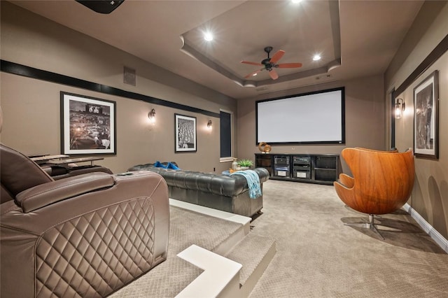 3810 Pawnee Pass, Austin, TX 78738 - home theater room featuring recessed lighting, carpet floors, a ceiling fan, and a tray ceiling