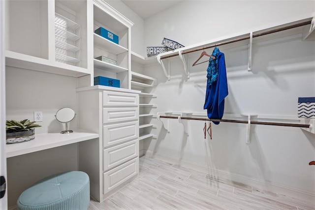 3810 Pawnee Pass, Austin, TX 78738 - walk in closet with light wood-style flooring