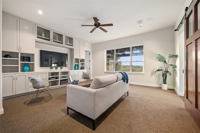 3810 Pawnee Pass, Austin, TX 78738 - living area with ceiling fan, carpet floors, recessed lighting, and a barn door