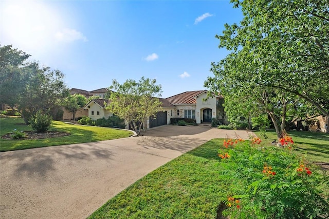 3810 Pawnee Pass, Austin, TX 78738 - mediterranean / spanish-style home featuring driveway, a garage, a front yard, and stucco siding