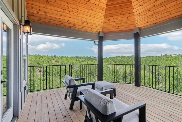 169 Tall Forest Dr, Bastrop, TX 78602 - wooden deck with a view of trees and a gazebo