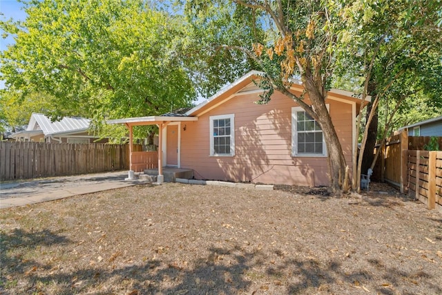 1114 Eleanor St, Austin, TX 78721 - view of front of house featuring driveway