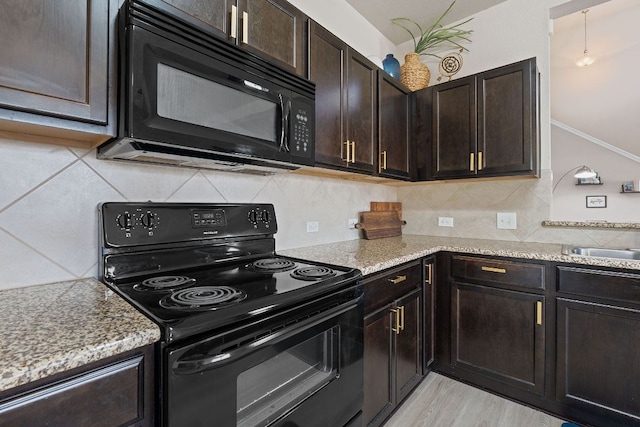 3526 Wickham Ln, Austin, TX 78725 - kitchen with black appliances, light stone countertops, and backsplash