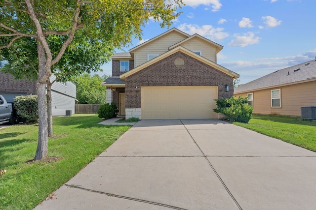 3526 Wickham Ln, Austin, TX 78725 - traditional-style house featuring brick siding, a front yard, a garage, and driveway