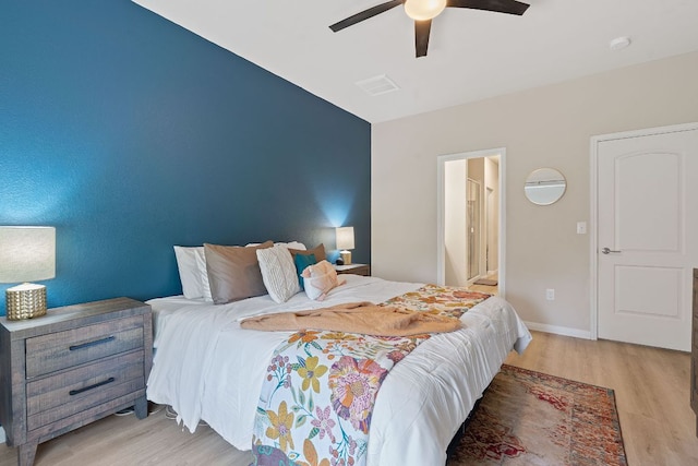 3526 Wickham Ln, Austin, TX 78725 - bedroom with light wood-style flooring and ceiling fan