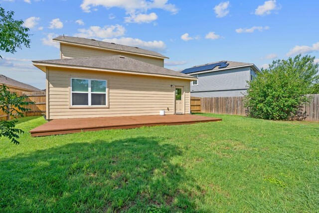 3526 Wickham Ln, Austin, TX 78725 - back of house featuring a fenced backyard and a deck