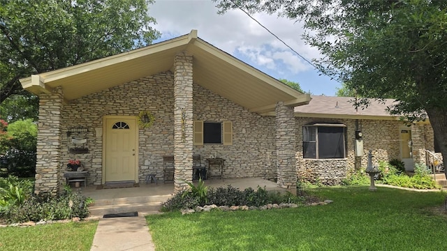 1801 Ash St, Georgetown, TX 78626 - view of front facade featuring a front lawn and stone siding