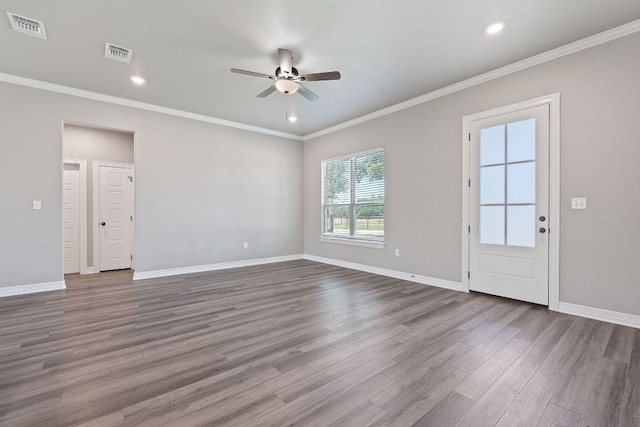 103 W Tomlinson St, Florence, TX 76527 - spare room with ceiling fan, dark wood-type flooring, crown molding, and recessed lighting