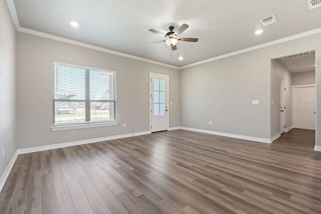 103 W Tomlinson St, Florence, TX 76527 - empty room with a ceiling fan, dark wood finished floors, ornamental molding, and recessed lighting