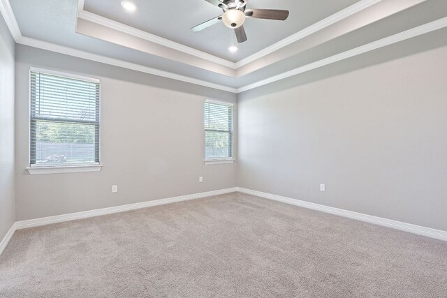 103 W Tomlinson St, Florence, TX 76527 - spare room with a raised ceiling, ornamental molding, carpet floors, a ceiling fan, and recessed lighting