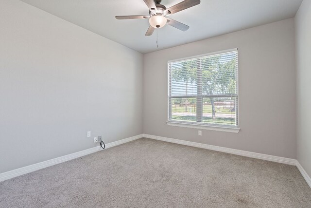 103 W Tomlinson St, Florence, TX 76527 - unfurnished room featuring carpet and a ceiling fan