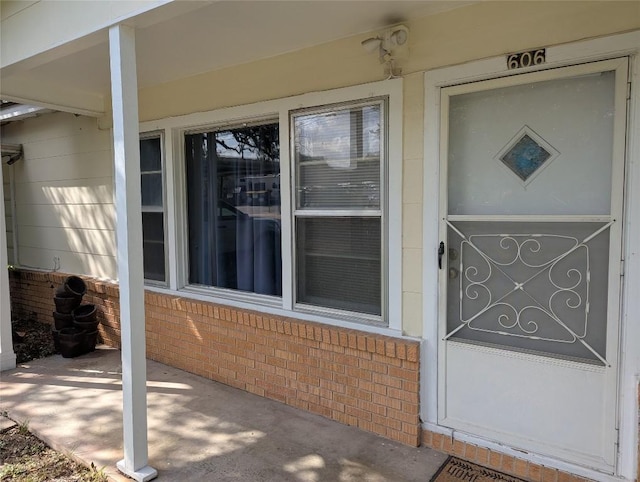 606 Scurry St, Austin, TX 78753 - entrance to property featuring brick siding