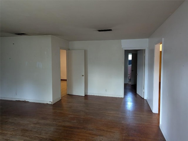 606 Scurry St, Austin, TX 78753 - empty room featuring dark wood-style floors