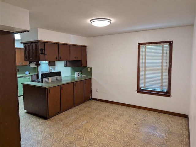 606 Scurry St, Austin, TX 78753 - kitchen featuring a peninsula and white dishwasher