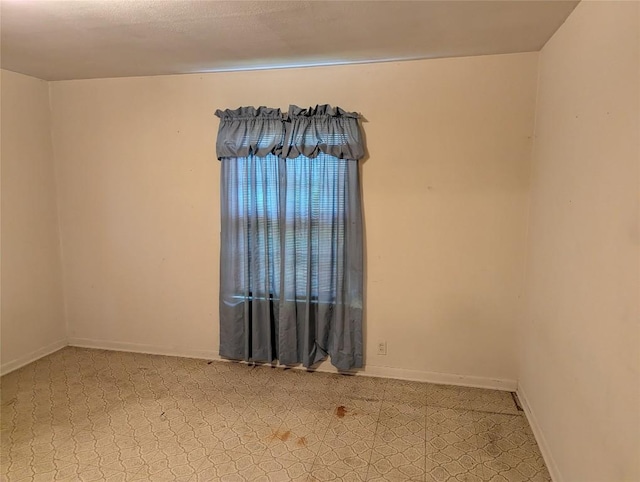 606 Scurry St, Austin, TX 78753 - empty room with baseboards
