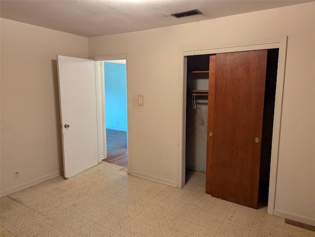 606 Scurry St, Austin, TX 78753 - unfurnished bedroom with a closet and light floors