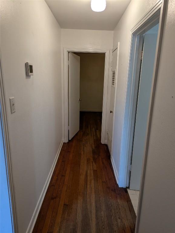 606 Scurry St, Austin, TX 78753 - hall with hardwood / wood-style floors