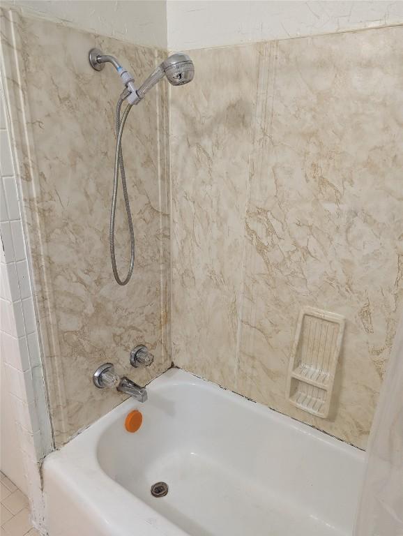 606 Scurry St, Austin, TX 78753 - bathroom featuring bathtub / shower combination