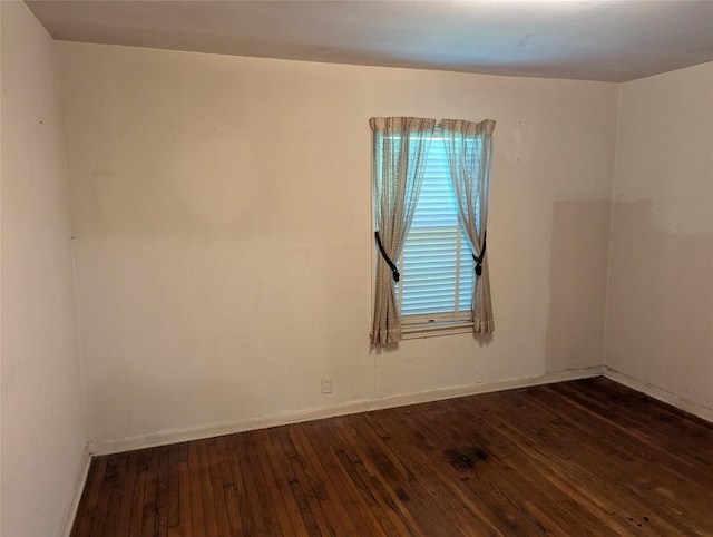 606 Scurry St, Austin, TX 78753 - spare room featuring dark wood finished floors