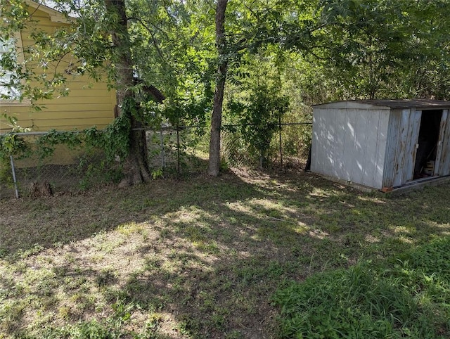 606 Scurry St, Austin, TX 78753 - view of yard featuring a shed