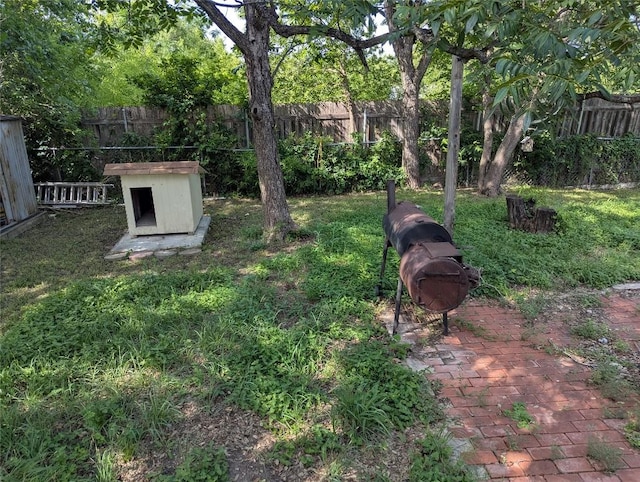 606 Scurry St, Austin, TX 78753 - fenced backyard with a patio area