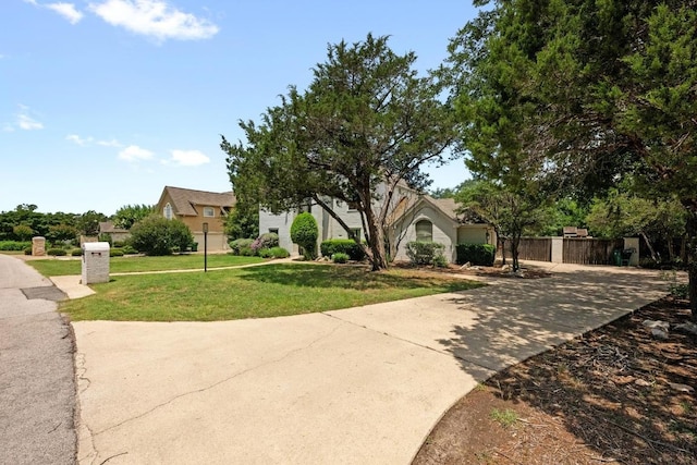 707 Malabar St, Lakeway, TX 78734 - view of front of property featuring concrete driveway