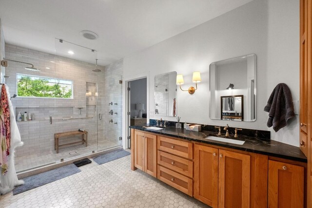 707 Malabar St, Lakeway, TX 78734 - bathroom featuring a stall shower and double vanity