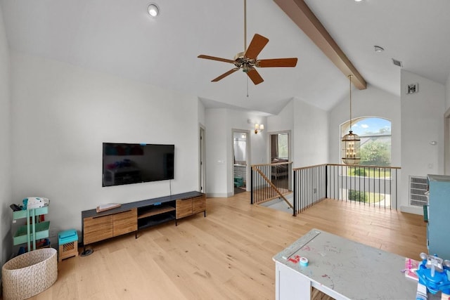 707 Malabar St, Lakeway, TX 78734 - living area with wood finished floors, beamed ceiling, ceiling fan, and high vaulted ceiling