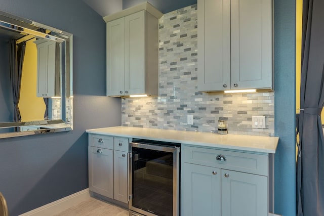 2800 Crystal Falls Pkwy, Leander, TX 78641 - bar with wine cooler and decorative backsplash