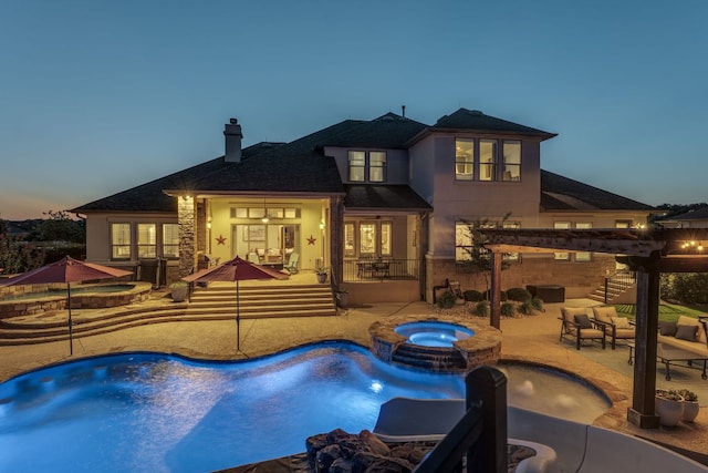 2800 Crystal Falls Pkwy, Leander, TX 78641 - rear view of property featuring a chimney, a pool with connected hot tub, a shingled roof, an outdoor living space, and a pergola