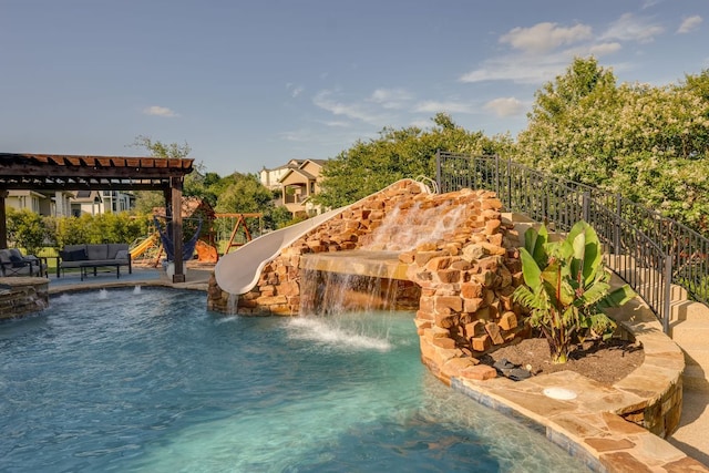 2800 Crystal Falls Pkwy, Leander, TX 78641 - view of swimming pool with a water slide, an outdoor hangout area, a pergola, and a patio area