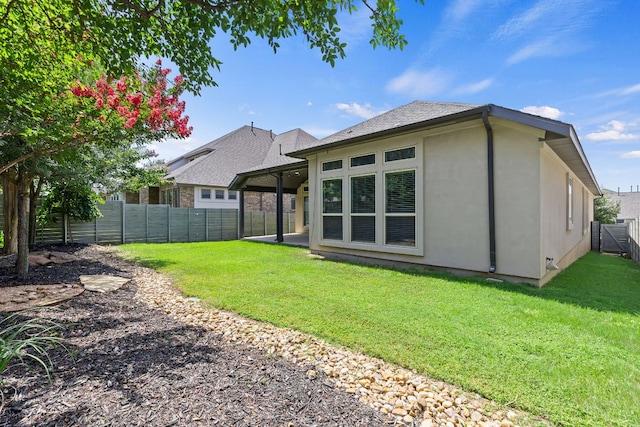 3604 Mercer Rd, Georgetown, TX 78628 - back of property featuring a fenced backyard and stucco siding