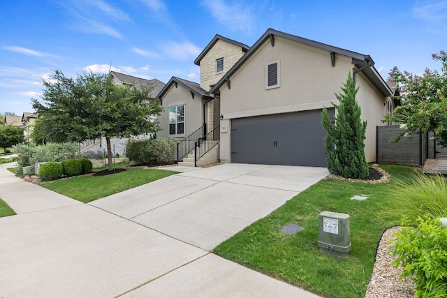 3604 Mercer Rd, Georgetown, TX 78628 - traditional-style house featuring stucco siding, driveway, a front lawn, and an attached garage