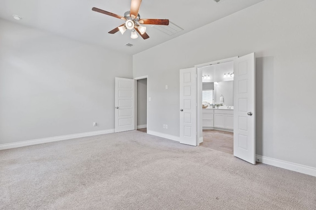 3604 Mercer Rd, Georgetown, TX 78628 - unfurnished bedroom featuring light carpet, connected bathroom, and a ceiling fan