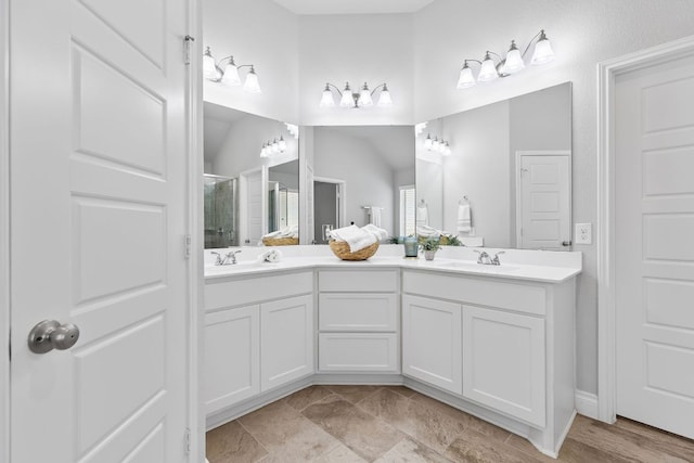 3604 Mercer Rd, Georgetown, TX 78628 - full bathroom with a stall shower and double vanity