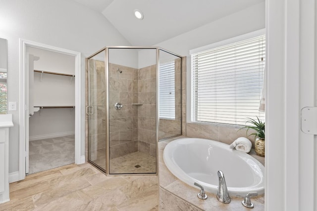 3604 Mercer Rd, Georgetown, TX 78628 - full bath featuring a stall shower, a bath, a spacious closet, lofted ceiling, and recessed lighting