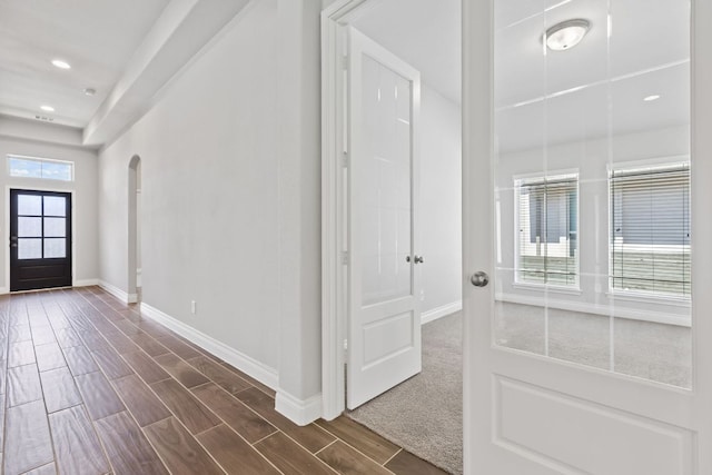 3604 Mercer Rd, Georgetown, TX 78628 - entryway featuring arched walkways, recessed lighting, and dark wood finished floors