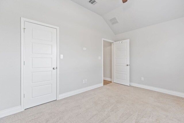 3604 Mercer Rd, Georgetown, TX 78628 - unfurnished bedroom with carpet flooring, lofted ceiling, and attic access