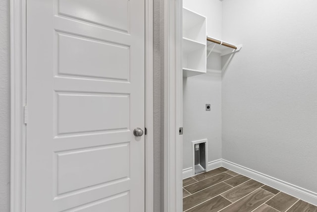 3604 Mercer Rd, Georgetown, TX 78628 - laundry room with hookup for an electric dryer and wood tiled floors