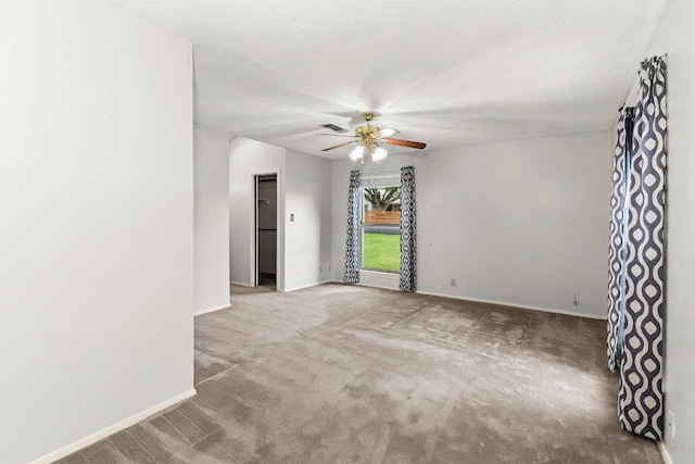 2403 N Shields Dr, Austin, TX 78727 - carpeted empty room featuring a ceiling fan and baseboards