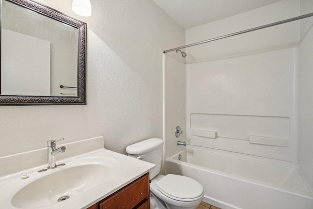 13413 Lismore Ln, Pflugerville, TX 78660 - full bathroom with shower / tub combination, vanity, and a textured wall